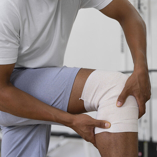 IntegraMed specialist performing a joint stabilization procedure to improve mobility and prevent future injuries in Palm Beach.