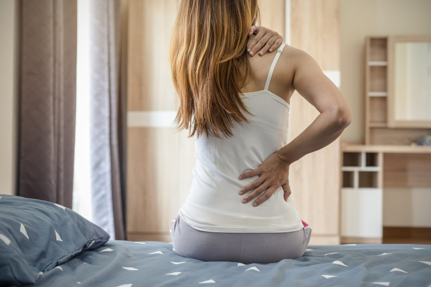can stress cause back pain ?, IntegraMed