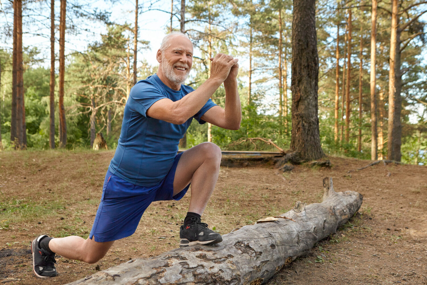 Active adult performing outdoor stretching exercises after successful microdiscectomy recovery